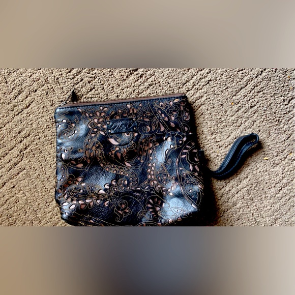 Patricia Nash clutch. It does fold in half. I love it, but just don’t use it. - Picture 1 of 1